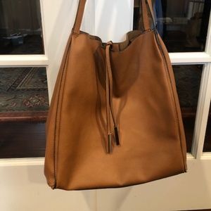 Large leather and suede hobo carry all shoulder bag.